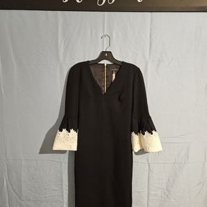 SIZE 0 TED BAKER BLACK AND WHITE CUFF DRESS GOLD ZIPPER IN BACK.